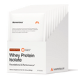 A white box labeled "Momentous Grass Fed Whey Travel Packs - Chocolate" contains 10 packets of foundational and performance dietary supplement.