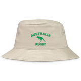The EMB S&S Activewear Nations of Rugby Australia Rugby Crusher Bucket Hat features beige cotton twill, green "AUSTRALIA RUGBY" text, and a kangaroo graphic—ideal for any rugby supporter.