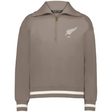 The EMB Augusta Women's Vintage New Zealand Heritage Prep Pullover features a light brown color, white fern graphic with "1884" on the left chest, and classic white stripes on the cuffs and hem for a timeless look.