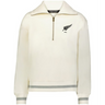 The EMB Augusta Women's Vintage New Zealand Heritage Prep Pullover is cream-colored with gray striped cuffs and hem, featuring a black fern leaf and "1841" on the left chest—blending classic style and timeless details.
