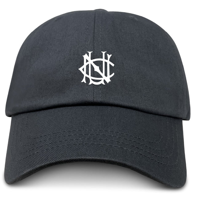 The UNC Rugby Adult Low-Profile Cotton Twill Dad Cap by EMB S&S Activewear is a black dad cap with a white, stylized overlapping letter logo and embroidered team branding on the front.