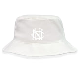 The UNC Rugby Crusher Bucket Cap by EMB S&S Activewear is a white cotton hat featuring an embroidered monogram-style logo on the front center, combining stylish sun protection with casual flair.