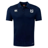 The UNC Rugby Club Dry Polo by EMB Canterbury is a navy blue short-sleeve polo with a collar, featuring white embroidered logos on the chest and shoulder. Made with breathable Vapodri technology for all-day comfort.