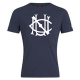 Navy blue cotton blend UNC Rugby Club Plain Tee by WRS Canterbury, featuring a large, stylized white monogram logo on the front—perfect for CCC Club style.