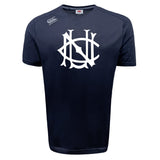 The UNC Rugby Tempo Vapodri T-Shirt by WRS Canterbury is a navy blue athletic performance tee with a large white monogram logo on the chest and a smaller white "Canterbury" logo on the right shoulder for superior comfort.