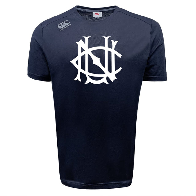 The UNC Rugby Tempo Vapodri T-Shirt by WRS Canterbury is a navy blue athletic performance tee with a large white monogram logo on the chest and a smaller white "Canterbury" logo on the right shoulder for superior comfort.