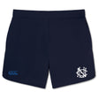 The UNC Rugby Women's Elite Woven Short by EMB Canterbury features zippered pockets, a white embroidered logo on the right leg, and a blue brand logo on the left. These navy blue gym shorts are designed for women.