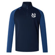 The UNC Rugby Elite First Layer by EMB Canterbury is a navy long-sleeve training top with contrasting blue sleeves, a quarter-zip front, VapoDri technology for comfort, and a white embroidered logo on the left chest.