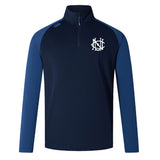 The UNC Rugby Elite First Layer by EMB Canterbury is a navy long-sleeve training top with contrasting blue sleeves, a quarter-zip front, VapoDri technology for comfort, and a white embroidered logo on the left chest.