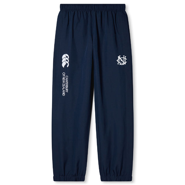 The UNC Rugby Cuffed Hem Stadium Pant by EMB Canterbury features a navy blue design with an elastic waistband, cuffed hems, and white logos on the thighs—ideal comfy rugby pants for sporty style.