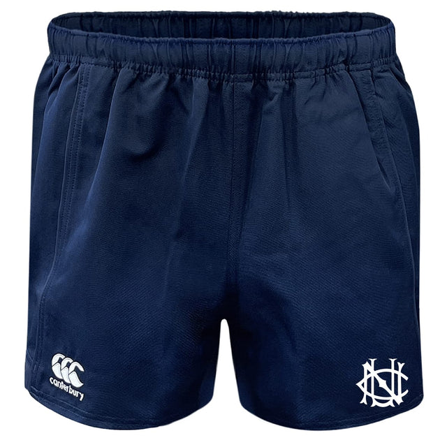 UNC Rugby Professional Polyester Rugby Short by EMB Canterbury in navy blue, featuring an elastic waistband, Canterbury logo on the left leg, and a white monogram on the right.
