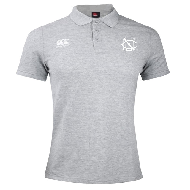 The UNC Rugby Waimak Polo by EMB Canterbury is a light grey, short-sleeve polo with a collar and white Canterbury logo emblems on the chest.