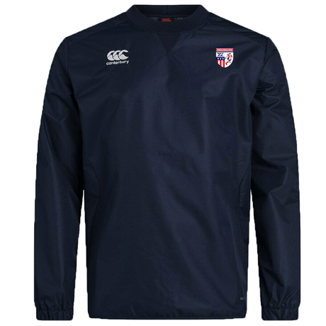 The Naperville Warriors Club Vaposhield Contact Top by Canterbury is a navy long-sleeve top with Vaposhield tech, EMB Canterbury logo on the right chest, and a red, white, and blue sports crest on the left chest.