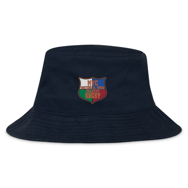The NYC British and Irish Selects Crusher Bucket Cap by EMB S&S Activewear is a navy cotton twill bucket hat with an embroidered shield patch reading "NYC Welsh & Irish Select Rugby" in red, white, and green for stylish sun protection.