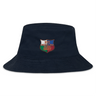 The NYC British and Irish Selects Crusher Bucket Cap by EMB S&S Activewear is a navy cotton twill bucket hat with an embroidered shield patch reading "NYC Welsh & Irish Select Rugby" in red, white, and green for stylish sun protection.