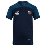 The NYC British and Irish Selects Vapodri Evader Jersey by EMB Canterbury is navy blue with short sleeves and moisture-wicking technology. It has the Canterbury logo on the right chest and a club emblem on the left, ideal for casual or active wear.