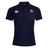 The NYC British and Irish Selects Waimak Polo by EMB Canterbury, in navy, showcases a rugby logo on the left chest and the iconic Canterbury logo on the right. Crafted from a comfy cotton-polyester blend, it offers stylish durability for casual outings and sports events.