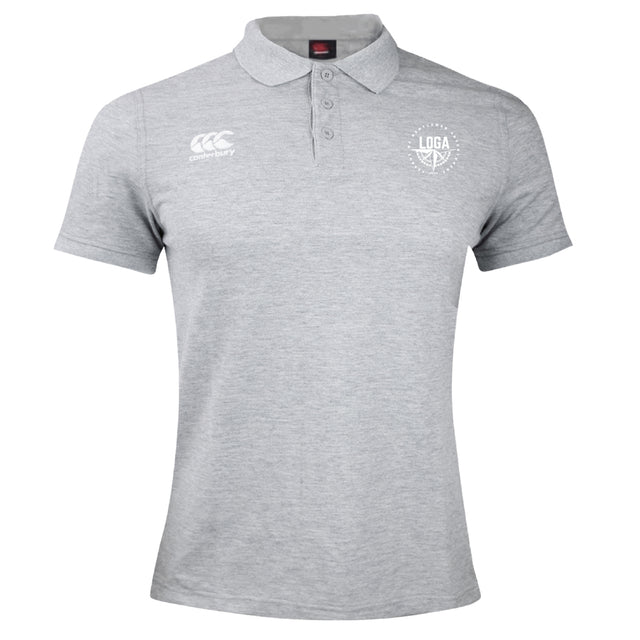 The League of Gentleman Adventurers Waimak Polo by EMB Canterbury is a light grey men’s short-sleeve rugby shirt featuring a collar, three buttons, and two white chest logos, inspired by the classic Canterbury Waimak Rugby Polo design.