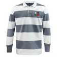 The NYC British and Irish Selects Classic Long Sleeve Hooped Rugby Jersey by EMB Mudoo features blue and white stripes, made from a comfy cotton/poly blend, with a colorful embroidered chest patch, perfect for leisurewear.