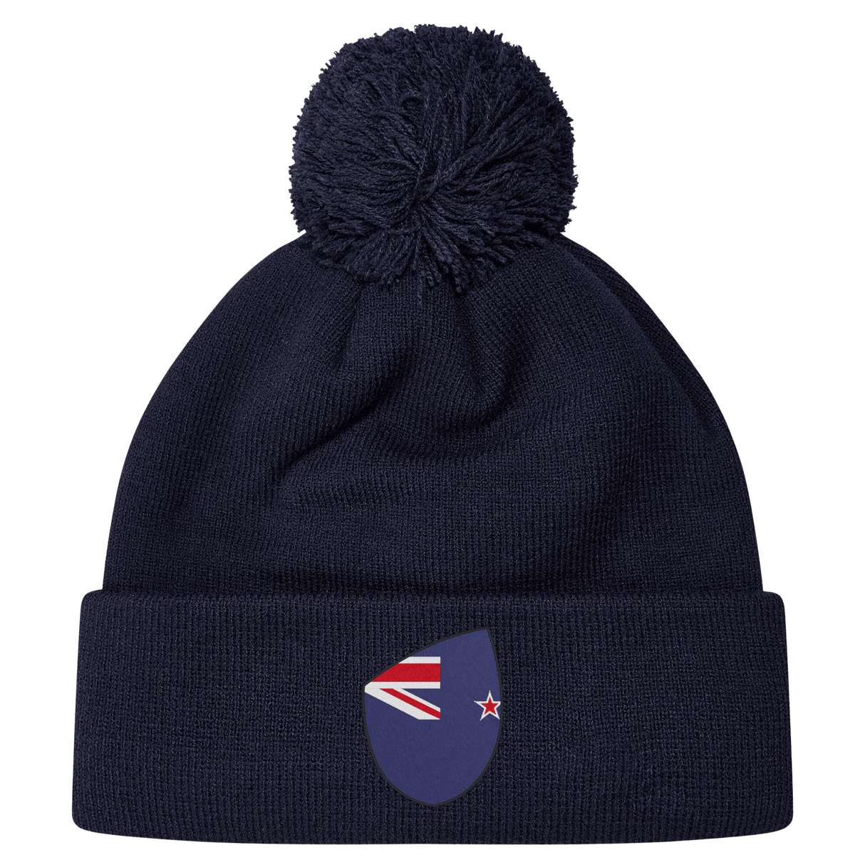 The EMB Canterbury New Zealand Shield Pom Pom Beanie is navy blue with a stylish pom-pom and features a small New Zealand shield emblem on the front.