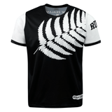 A black and white t-shirt featuring a large white fern leaf design across the front, with "New Zealand" text partially visible at the collar and "Rugby" text on the right sleeve, this **Nations of Rugby New Zealand 7s Rugby Flag Supporters Jersey** by **Admiral** is perfect for 7s rugby supporters.