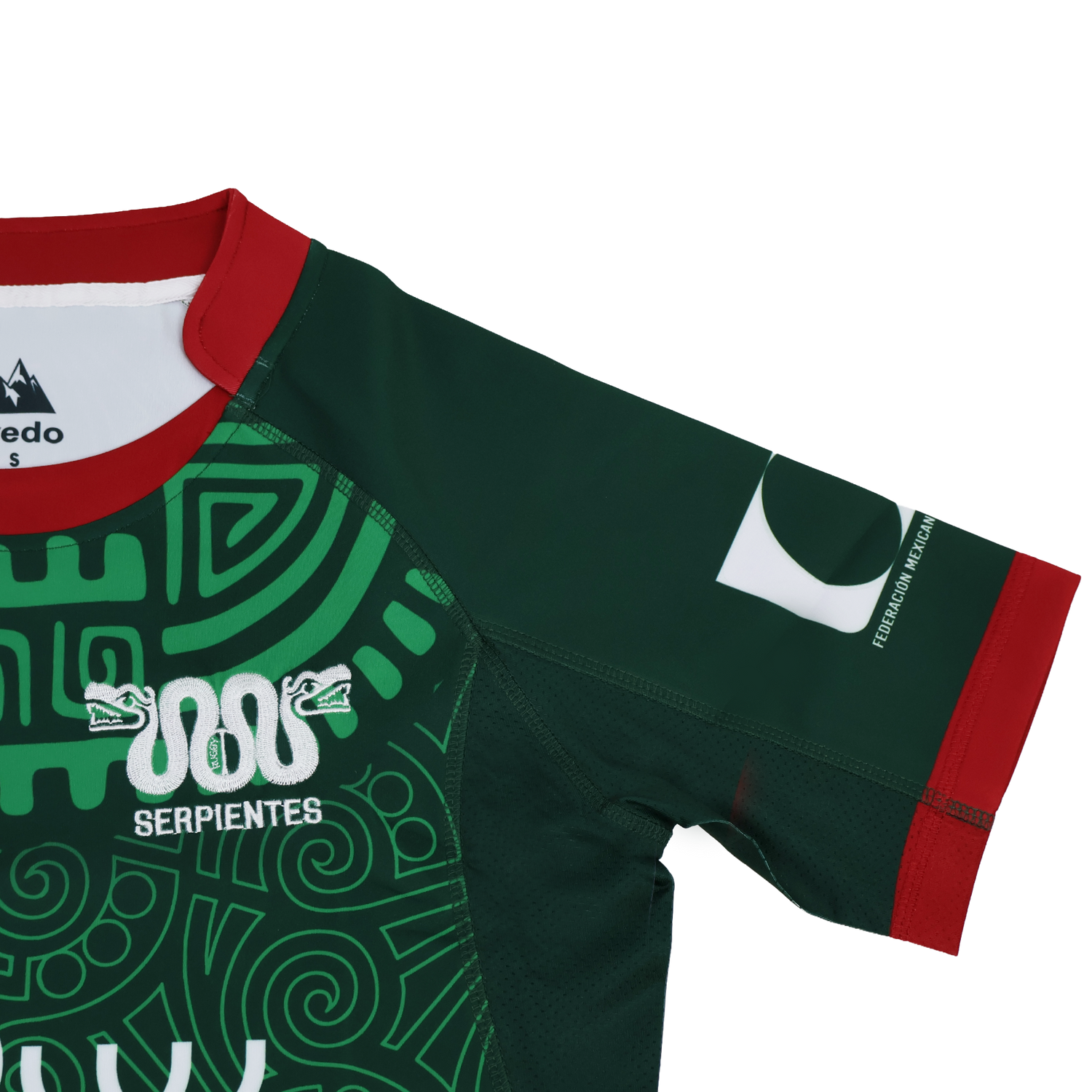 The Las Serpientes Mexico Rugby Replica Jersey by Credo Rugby features green fabric, red trim, white snake graphics, the word "Serpientes," and a bold front pattern—ideal for fans wanting an authentic replica from Credo Rugby.