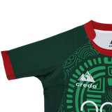 The Las Serpientes Mexico Rugby Replica Jersey by Credo Rugby features a green geometric pattern, red collar and sleeve trim, and the Credo Rugby logo with mountain graphic—boldly inspired by the iconic original jersey.