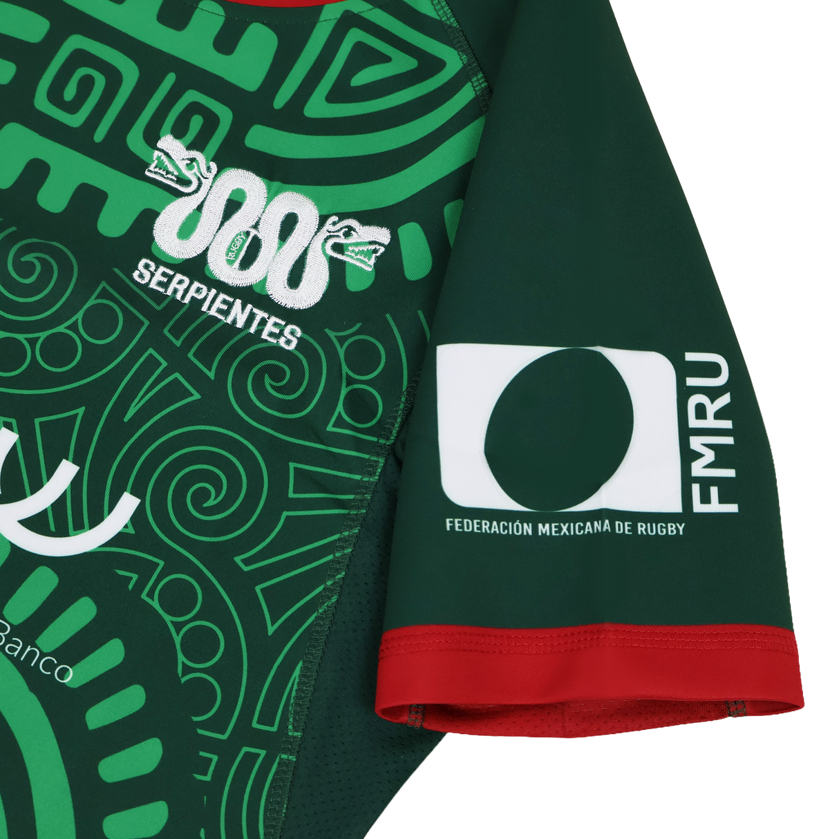 Show your support for Mexico’s national team with the Las Serpientes Mexico Rugby Replica Jersey by Credo Rugby, featuring bold green fabric, red trim, abstract designs, “Serpientes,” and the FMRU logo on the sleeve.