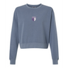 The Women's OMBAC Youth Rugby Mid-Length Crewneck Sweatshirt by EMB S&S Activewear is a blue, garment-dyed women's crewneck featuring a small purple and white shield logo with "Orange Rugby" on the left chest.