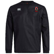The Ohio State University Alumni Club Vaposhield Contact Top by EMB Canterbury is a black long-sleeve pullover with a right chest Canterbury logo, red and white embroidered emblem, and water-repellent Vaposhield technology—perfect rugby gear.