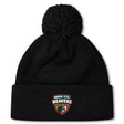 The Omaha Beavers RFC Pom Pom Beanie by EMB Canterbury is a black bobble hat with a pom-pom and features an "Omaha R.F.C. Beavers" logo patch on the front.