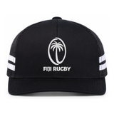 The Fiji Low Profile Stripe Trucker Cap - Limited Edition by Augusta Sportswear features black fabric, white side stripes, and an oval Fiji Rugby logo with a palm tree and "FIJI RUGBY" text on the front.