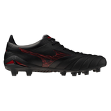 The Mizuno Morelia Neo IV FG Made in Japan soccer cleat in black with 40th Anniversary Red accents features a textured pattern for a barefoot feel, displayed side-on against a white background.