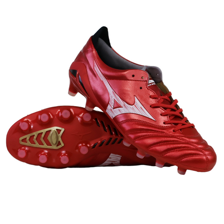 A pair of Mizuno Morelia Neo IV FG Made in Japan soccer cleats (Morelia 40th Anniversary Red/White/Black), one upright and one on its side showing the sole, studs, and barefoot feel design.