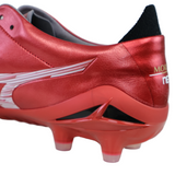 Close-up of the heel and sole of the Mizuno Morelia Neo IV FG Made in Japan - Morelia 40th Anniversary Red/White/Black firm ground soccer cleats, showing studs, white and black accents, and part of the Mizuno logo.