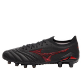 The Mizuno Morelia Neo IV Beta FG Made in Japan - Black/Morelia 40th Anniversary Red is a premium kangaroo leather soccer cleat with red accents, a large red logo, and molded studs for firm ground play.