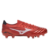 The Mizuno Morelia Neo IV Beta Elite FG - Morelia 40th Anniversary in Red/White/Black is a premium soccer cleat crafted from supple kangaroo leather, featuring a lace-up design and molded studs for firm ground play.