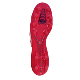 The Mizuno Morelia Neo IV FG rugby boots by Mizuno, in White/Pink Tetra/Fuchsia Purple, feature a central traction pattern and multiple round studs on a premium K-leather sole, seen from the bottom against a white background.