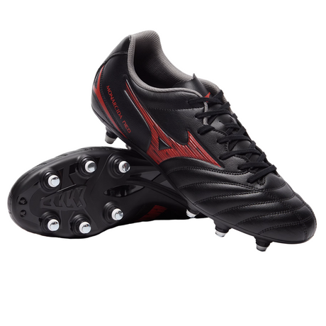 A pair of Mizuno Monarcida Neo III Select SG football boots in Black/Morelia 40th Anniversary Red, one upright and one on its side showing metal studs on the synthetic leather upper sole.