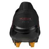 Rear view of a black Mizuno Neo IV Beta Elite AG boot with "MORELIA neo" text, glossy heel, and gold studs, in Black/Morelia 40th Red/Black colorway.