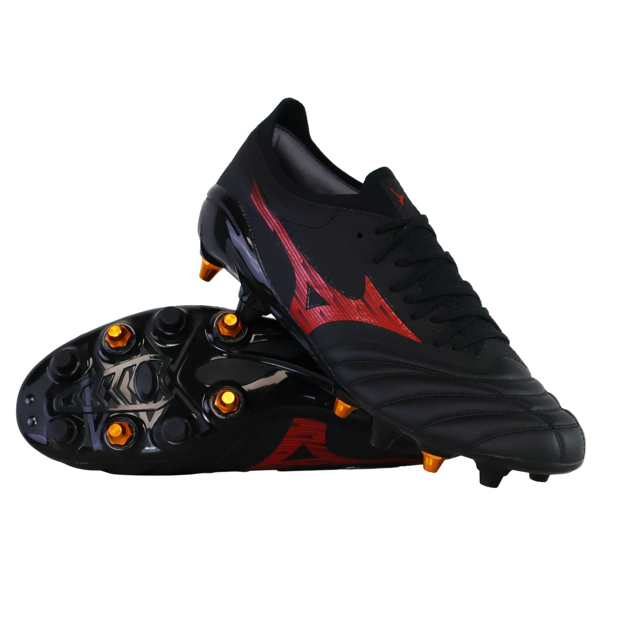 A pair of Mizuno Neo IV Beta Elite AG football boots in Black/Morelia 40th Red/Black, with one shoe upright and the other on its side showing gold studs and the sole.