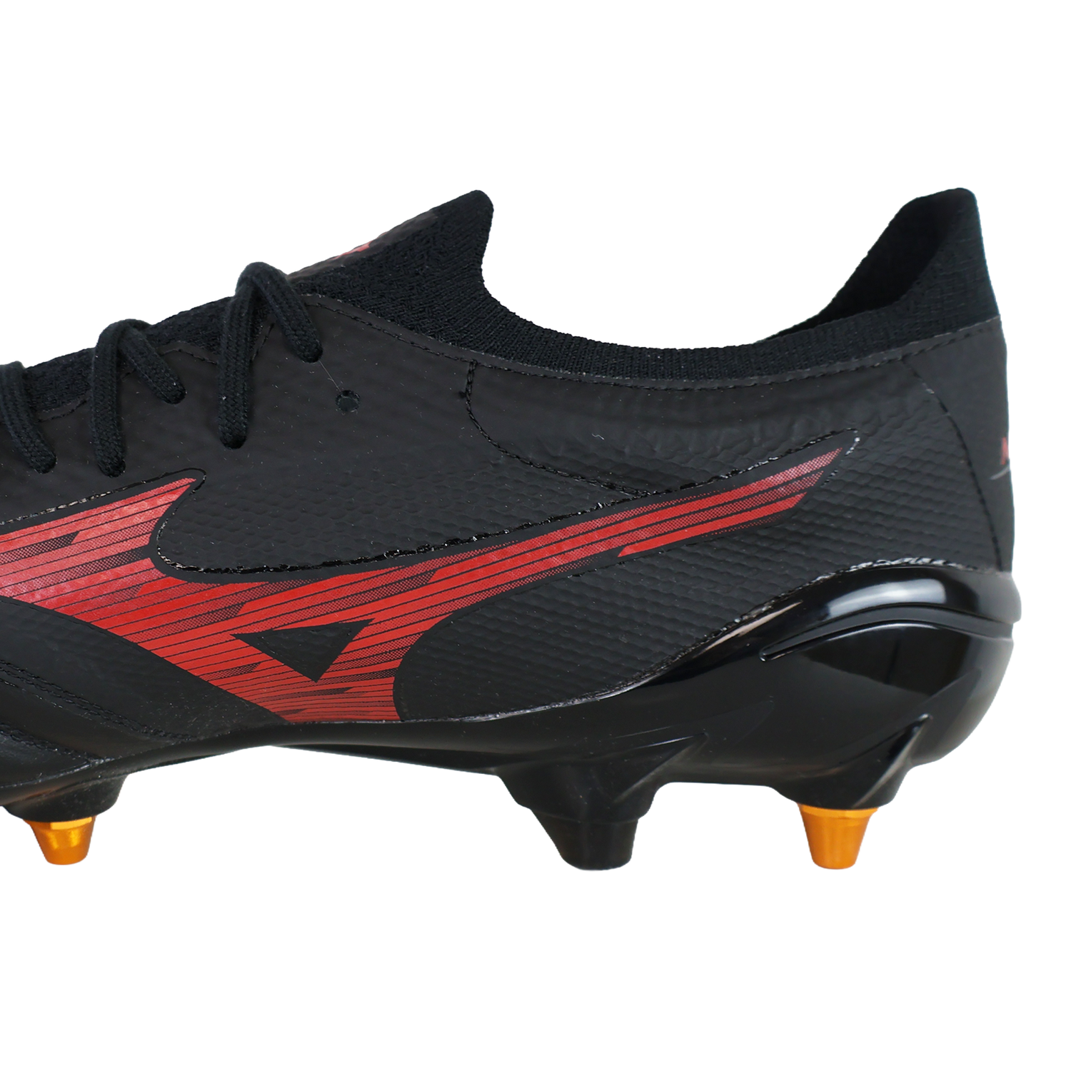 Close-up of the Mizuno Neo IV Beta Elite AG football boot in Black/Morelia 40th Red/Black, with orange-tipped studs and side logo—ideal for players seeking quality and comfort.