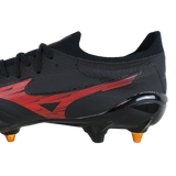 Close-up of the Mizuno Neo IV Beta Elite AG football boot in Black/Morelia 40th Red/Black, with orange-tipped studs and side logo—ideal for players seeking quality and comfort.