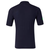 Back view of the Leicester 26/27 Off Pitch Polo by Castore, a plain, short-sleeved navy blue polo with a small green and yellow circular patch on the left sleeve.