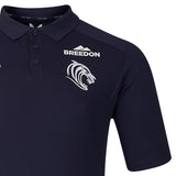 The Leicester 26/27 Off Pitch Polo by Castore is a navy blue shirt featuring a white “Breedon” sponsor logo, a stylized roaring tiger emblem, and three buttons on the front—an elegant polo inspired by the classic Castore rugby shirt.