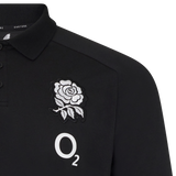 The England 26/27 Off-Pitch Polo by Castore features a stylish design with a white rose emblem and "O₂" logo on the chest—perfect for England Rugby fans looking for smart off-pitch attire.