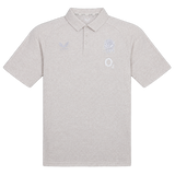 The England 26/27 Off-Pitch Polo by Castore features a light grey design with short sleeves, a collar, three buttons, and white embroidered logos—a rose, "O2," and stylized bird—ideal for an off-pitch England Rugby look.