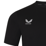 The England 26/27 Off-Pitch Tee by Castore features the signature winged logo and brand name in white on the left chest—a stylish black tee perfect for everyday wear.