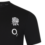 The England 26/27 Off-Pitch Tee by Castore is a black shirt with a white rose and "O₂" on the front, ideal for England Rugby fans.