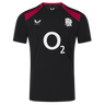 The England 26/27 Performance Training Tee by Castore features black short sleeves, red shoulder panels, a white "O2" sponsor logo, the rugby rose emblem, Castore branding, and moisture-wicking tech for comfort.